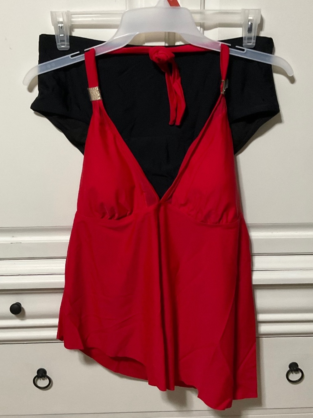 New XXL two-piece swimsuit featuring a red halter-style top and black bottoms.